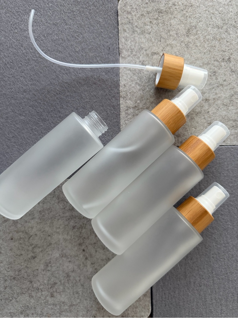 Frosted 100ml Glass Spray Bottle with Bamboo Pump - Clear/Beige set of 4